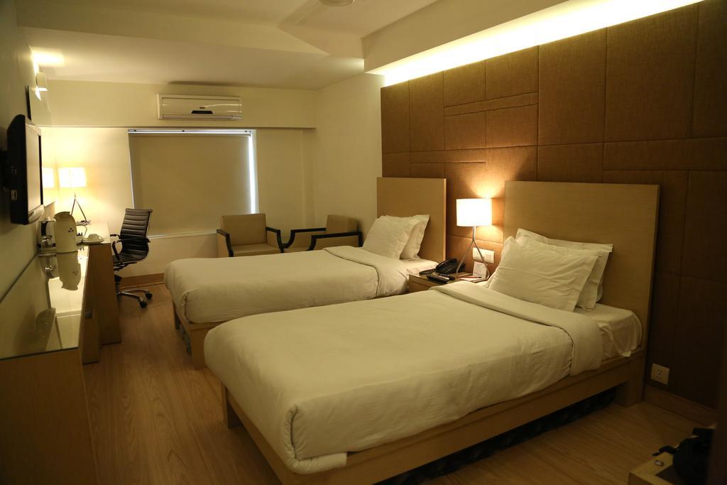 Hotel President Dehradun Oda fotoğraf