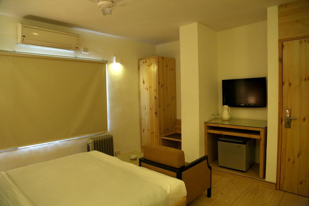 Hotel President Dehradun Oda fotoğraf